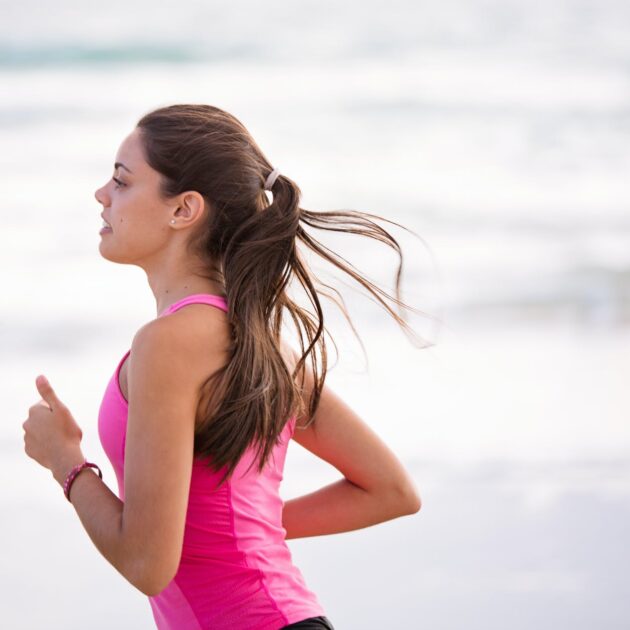 selective focus photography of woman in pink shirt